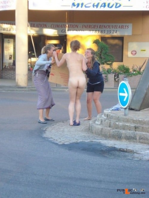 Public nudity photo lostadare:At least they gave her some cardboard for her... Public Flashing