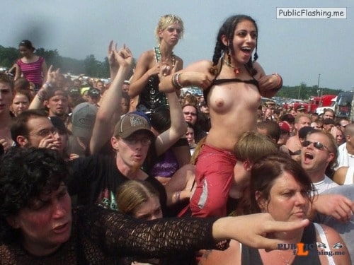 Public nudity photo festivalgirls:Better her than the girl behind her... Public Flashing