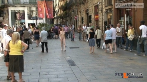 Public nudity photo exposed on public:Naked walk through Barcelona gets many... Public Flashing
