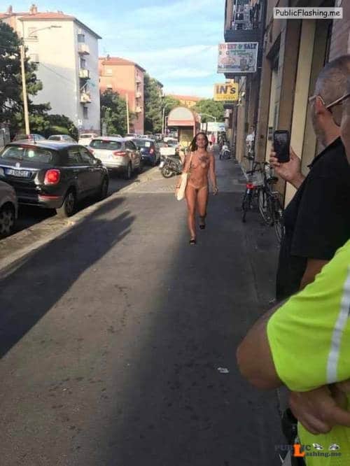 Public nudity photo exposed on public:Naked girl walking in Bologna, Italy... Public Flashing