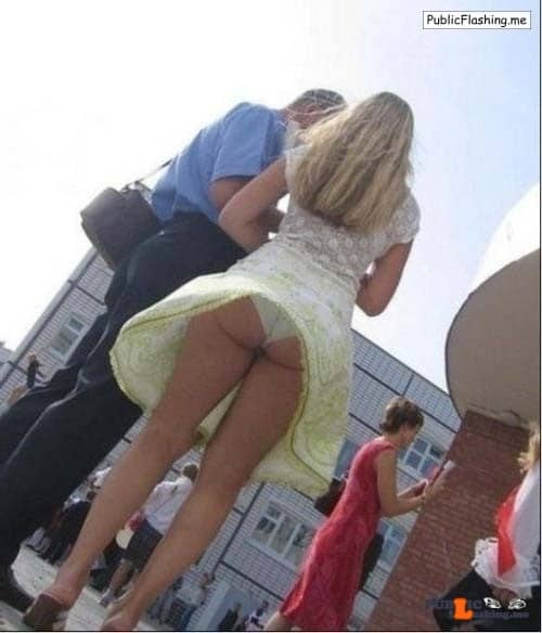 Amateur: Voyeur upskirt panties photo of an amateur blonde An amateur blonde in swaying dress was a target of some unknown upskirt voyeur. He used the moment when wind lifted up a dress of this blonde to made a perfect shot of her...