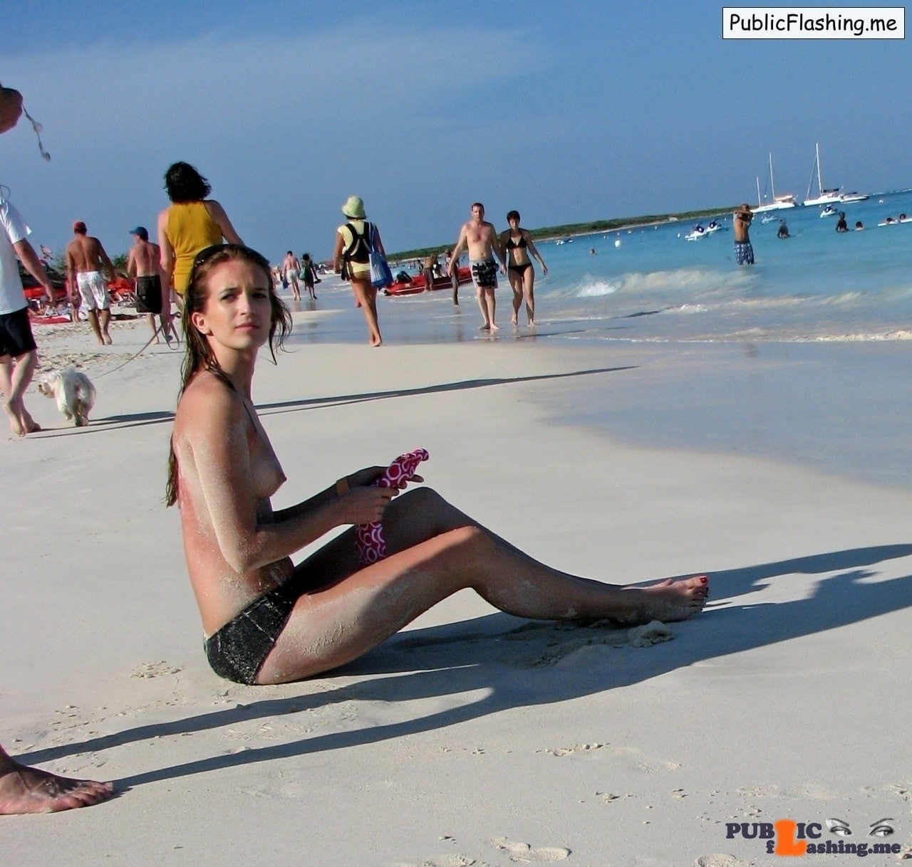 beach teenager topless - Teen brunette is sitting in the sand topless Cute teenage brunette is on the beach, sunbathing topless on the afternoon Sun and enjoy in a freshness of the ocean. She is sitting in the sand without bikini top of some... - Amateur