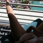 Wife masturbating on hotel balcony POV photo