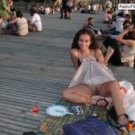 Upskirt pussy flashing with a smile – No panties!