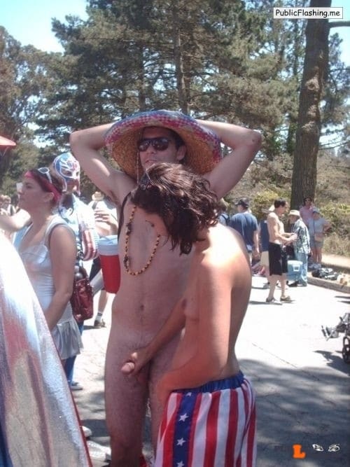 my wife naked in public - Topless wife holding cock of her nude hubby in public Topless wife is wearing shorts in colors of american flag and grabbing dick of her naked husband in some public place. They are surrounded with a lot of strangers but as... - Amateur