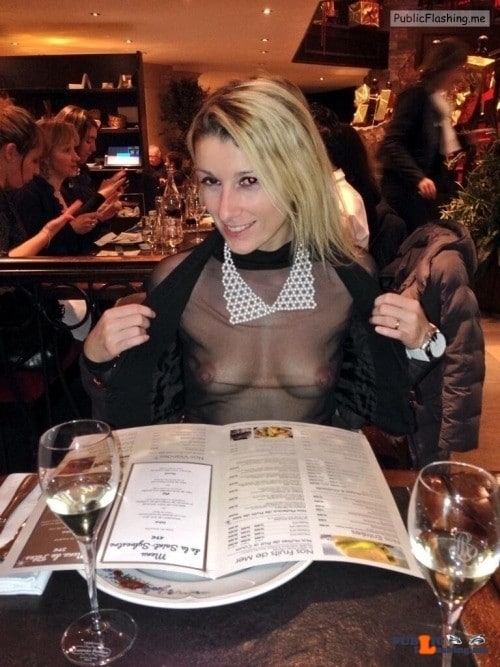 Amateur: Blonde wife in black see trough blouse no bra in restaurant