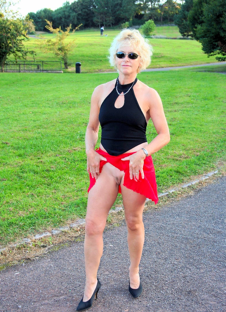 nude in public park photoshooting backstage - Mature MILF Flashes Her Shaved Pussy in Public Park A mature MILF confidently flashes her shaved pussy in a public park, holding her skirt open to expose her most intimate area. Her bold act challenges norms a... - Amateur